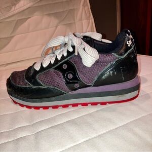 Saucony Jazz Triple sneakers/ Purple material, black leather.Cool red souls too!
